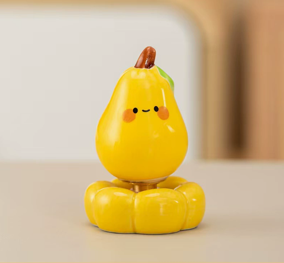 Cute pear-shaped spinning ornament