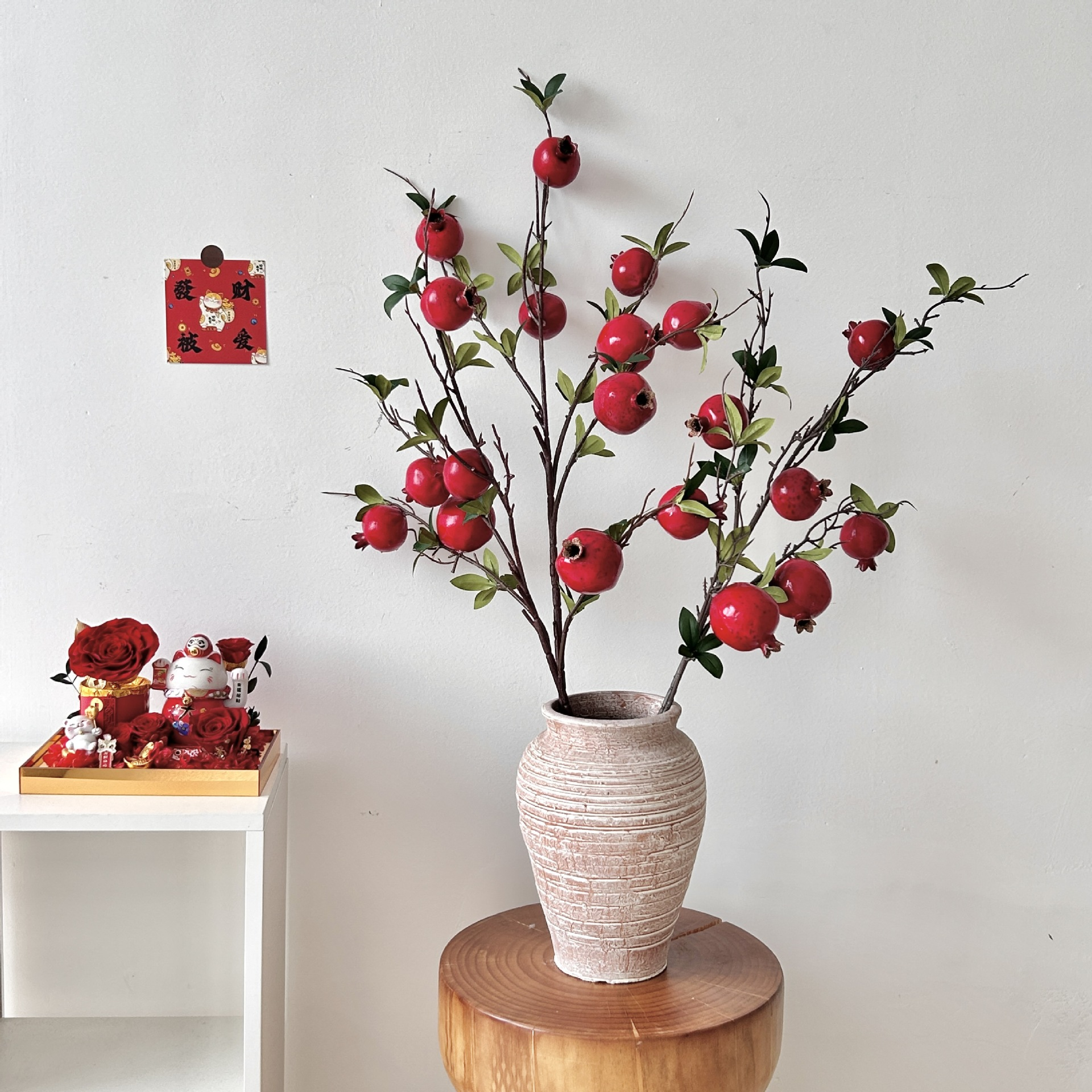Artificial pomegranate flowers with leaves