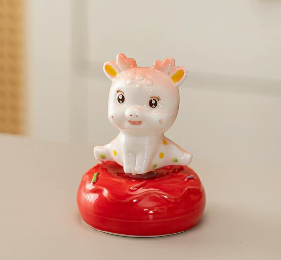 Cute deer-themed spinning figurine